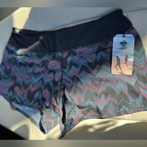 NWT. Rabbit Lightweight Runnings Shorts. Size Women’s Medium.